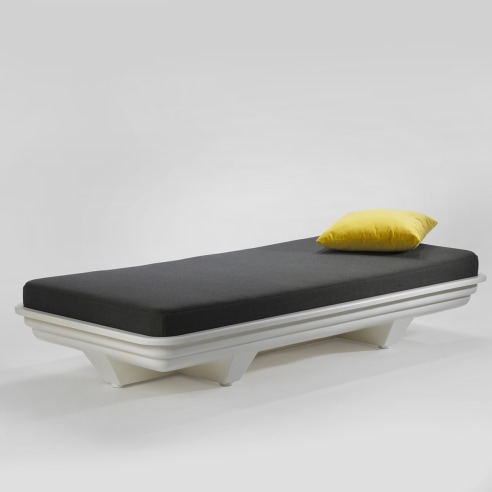 daybed in an empty room