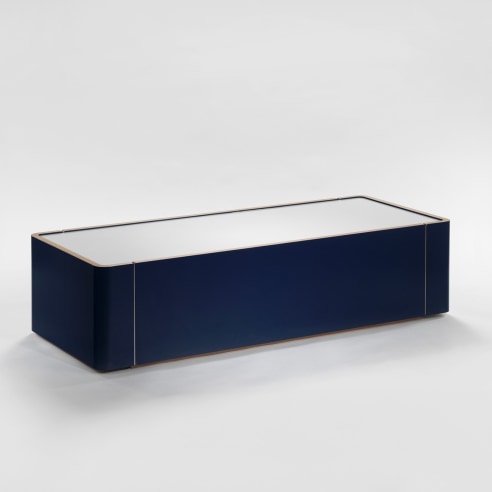 image of a coffee table in a white room