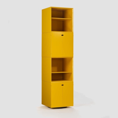 photograph of a yellow cabinet in a blank room 