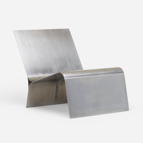 Folded chair by Maria Pergay in steel. Shot of chair from front on where you can see the entire chair. 
