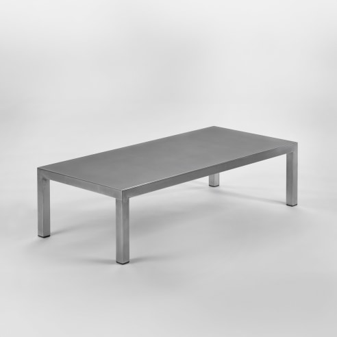 silver low table in a blank room