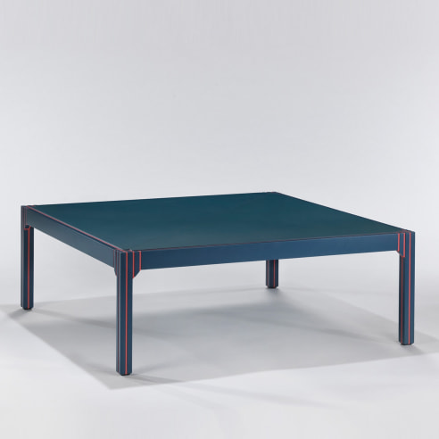 Blue lacquered table with orange detailing by Pierre Paulin