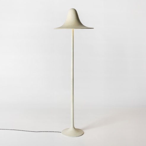 minimal lamp in an empty room