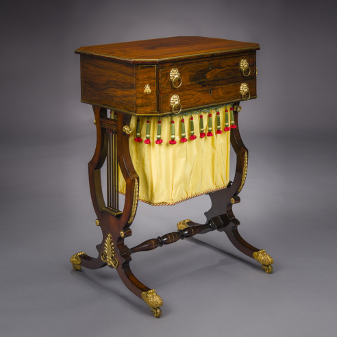 "Neo-Classical Work Table with Lyre Ends," about 1815. Attributed to Thomas Seymour (1771–1848), Boston. Rosewood, gilt-brass and gilt-bronze and ormolu mounts, toe-caps, and castors, and fabric work bag 29 3/4 in. high, 20 5/16 in. wide, 16 3/4 in. deep.