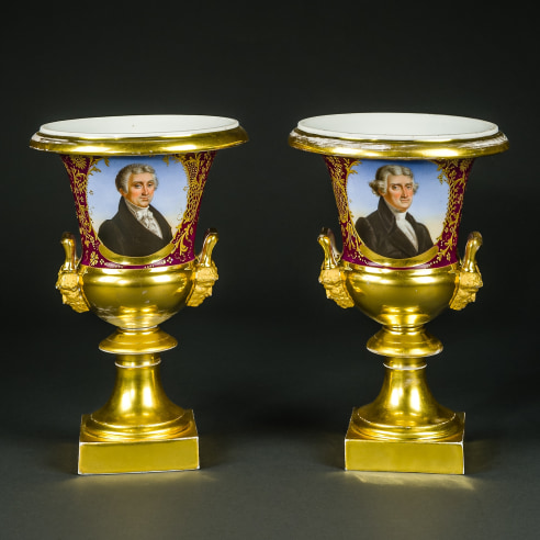 a pair of "old paris" porcelain vases showing portraits of Thomas Jefferson and James Monroe