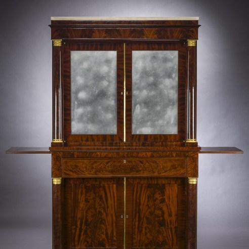 Cabinet with Mirrored Doors, about 1820. Attributed to Duncan Phyfe (1770–1854), New York. Mahogany with ormolu capitals and bases, gilt-brass door moldings, keyhole liners, and knobs, marble, and mirror plate, 78 5/8 in. high, 35 in. wide,22 in. deep (overall). Detail.