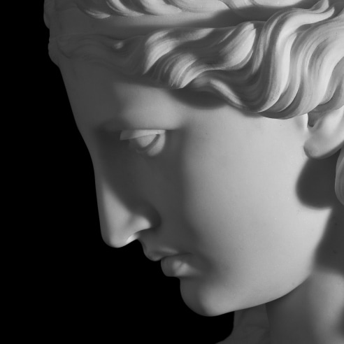 CHAUNCEY BRADLEY IVES (1810–1894), Ariadne, 1861. Marble bust, 31 in. high (moody, shadowy close-up detail of profile of face).