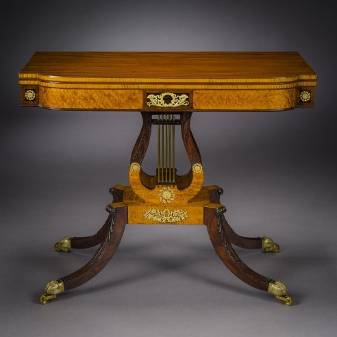 "Neo-Classical Work Table with Lyre Ends," about 1815. Attributed to Thomas Seymour (1771–1848), Boston. Rosewood, with brass line inlay and brass-over-wood baguette moldings, gilt-brass and gilt-bronze and ormolu mounts, toe-caps, and castors, and fabric work bag, 29 3/4 in. high, 20 5/16 in. wide, 16 3/4 in. deep