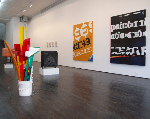 Installation view of large sculptures and paintings 