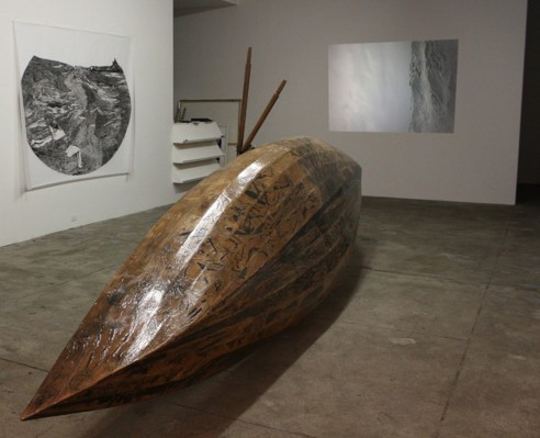 Wooden boat on gallery floor