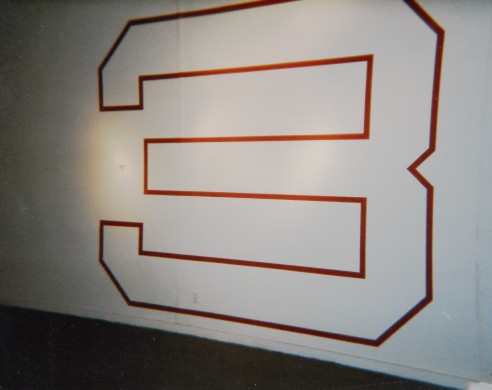 Numeral 3 outlined on gallery wall
