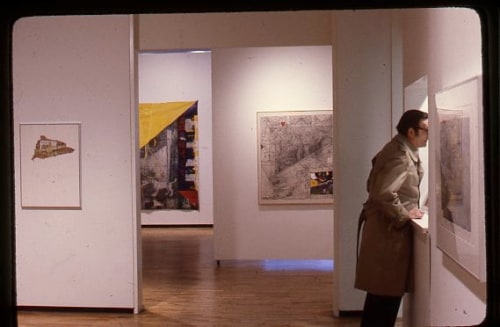 Critic Ted Wolff visiting the gallery to view the 1981 William T. Wiley exhibition at Allan Frumkin Gallery, New York. Installed behind him, l-r: Magabark, 1981; Bad Balance II: Freedumb and Ridicule, 1981; Still Life for Atlantic, 1981; and to his right, Scam Quentin, 1981.

Image courtesy the George Adams Gallery archives.