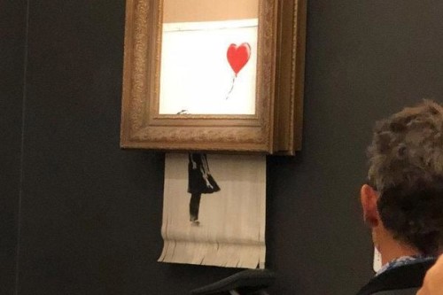 Banksy Painting Self-Destructs After Reaching a Record $1.4 Million at Auction