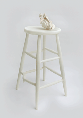 sculpture on stool