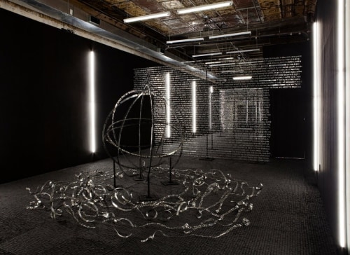 Art installation of metal type and globe