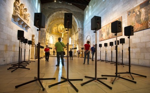 Circle of speakers set up inside The Cloisters