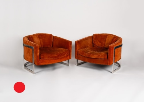 Orange armchairs sold