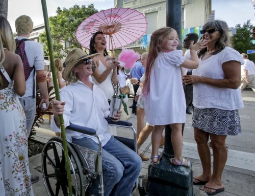 White Linen Night devotees stroll the Warehouse District in search of art, spirits and a good time