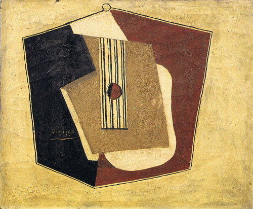 Picasso, Guitar, 1918.  This image represents a painting by Picasso which depicts a still life representing a guitar in a Cubist manner.  The main colors are yellow, dark red, black and ocre. The ocre part is actually real sand that have been used as a material to fill up the guitar.