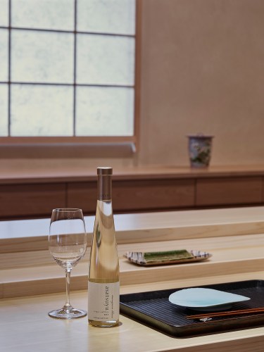 wine glass, half-bottle of asatsuyu white wine, table setting at Kenzo Napa sushi bar