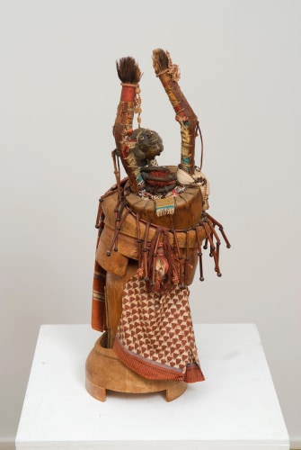 This is an image of an artwork made by John Outterbridge in 1979 titled: The Elder, Ethnic Heritage Series.