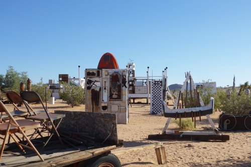 This is an image of the Noah Purifoy Desert Art Museum.