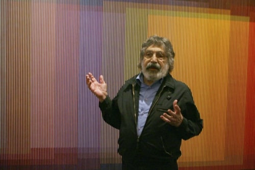 Venezuelan artist Carlos Cruz-Diez talks about his Physichromie No. 500 in New York in 2008.(Associated Press)