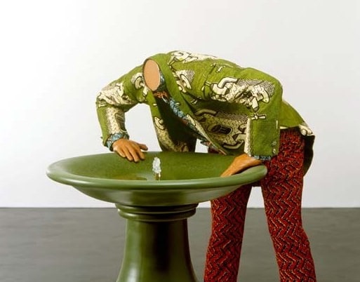 Image of Yinka Shonibare's "Headless Man Drinking"
