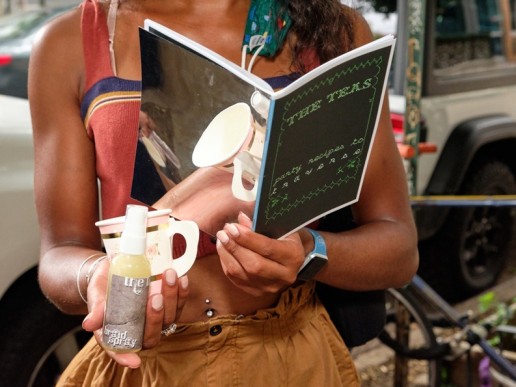 Image of a person holding a book