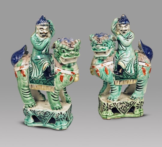 Rare Pair of Chinese Verte Glazed Biscuit Porcelain Figures Riding upon Fu Lions