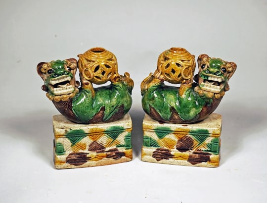 Pair of Chinese Sancai Glazed Porcelain Playing Fu Lions