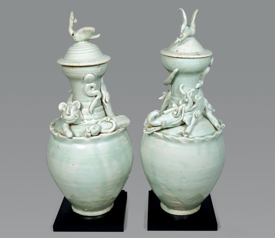 Fine and Rare Pair of Chinese Qingbai Glazed Vases and Covers