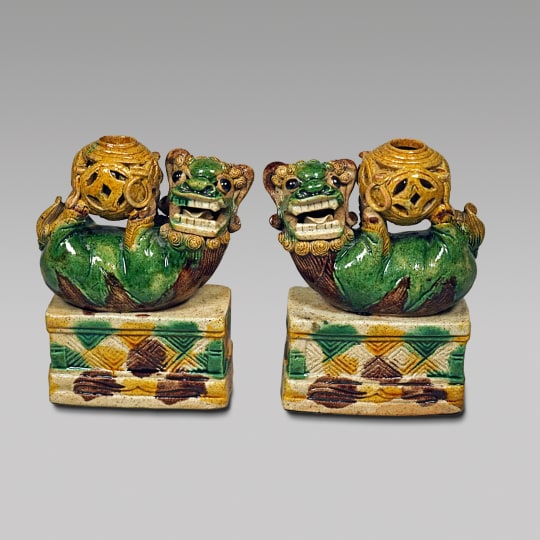 Pair of Chinese Sancai Glazed Porcelain Playing Fu Lions