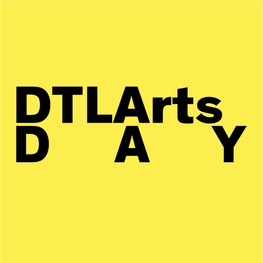 A yellow background with black lettering that spells "DTLA Arts Day"