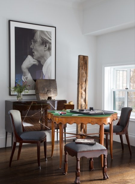 A pair of Maison Leleu sidechairs, circa 1925 and a mid-century game table covered in felt
