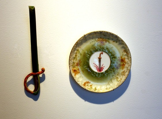 Adeela Suleman THANK YOU FOR YOUR SERVICE 4 2014 Found porcelain plate with enamel paint and hand-painted dagger Plate: 5 x 5 in. / Dagger: 7 x 2 x 4.5 in.