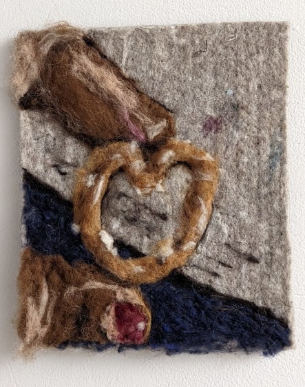 Pretzel heart challenge, 2022  Needle felted wool on industrial felt  8.5 x 7.5 in