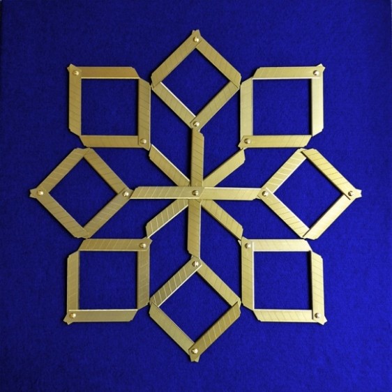 Abdullah M. I. Syed Margin of Error - Rosette on Blue (Ed. of 5) 2017 Titanium utility knife blades, brass, stainless steel, felt and tempered hardwood 23 x 23 in.