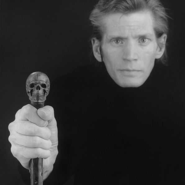 Self Portrait with Skill cane in hand.