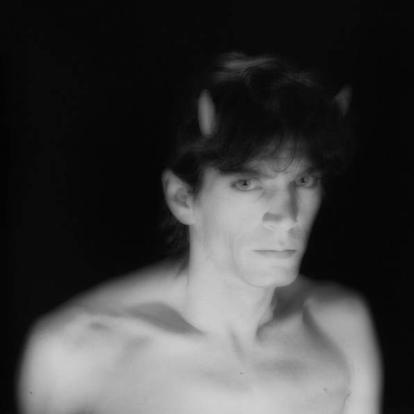 Self=portrait with devil horns