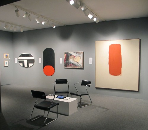 (from left) Ilya Bolotowsky, "Black and White Elipse,"  1963, oil on canvas, 30 x 47 in., Leon Polk Smith, "Black Over Red," 1960, oil on canvas, 55 x 28 in., Norman Bluhm, "Winter," 1961, oil and paper mounted on canvas, 28 x 36 in.