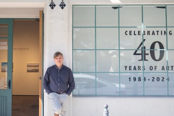 NATHAN VONK standing in front of Sullivan Goss on the 40th Anniversary of the gallery, Photo by INGRID BOSTROM for the Independent