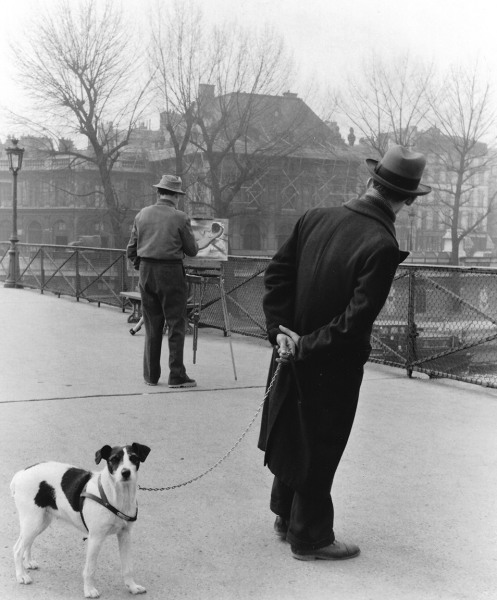 Robert Doisneau, Fox Terrier sur le Ponts de Arts (Fox Terrier on the Pont des Arts), with painter Daniel Pipard, Paris, France, 1953