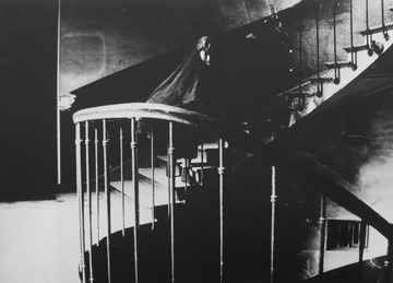 Deborah Turbeville, The Staircase: Aurelia Weingarten in Commes des Garcons, Passage Vivienne, Paris, 1980