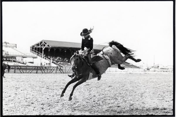 Arthur Elgort, Cowgirl Riding Bucking Bronco, Cheyenne, Wyoming, 1989