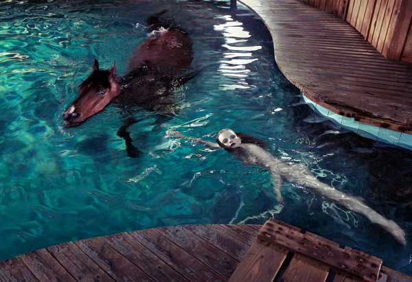 Steven Klein, Girl in Pool with Horse, 2005