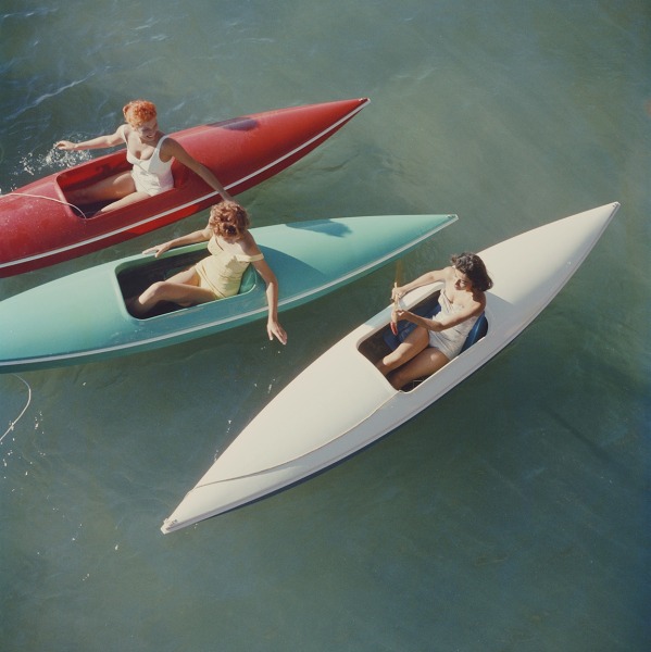 Slim Aarons, Lake Tahoe Trip: Young women canoeing at Zephyr Cove on the Nevada side of Lake Tahoe, USA, 1959