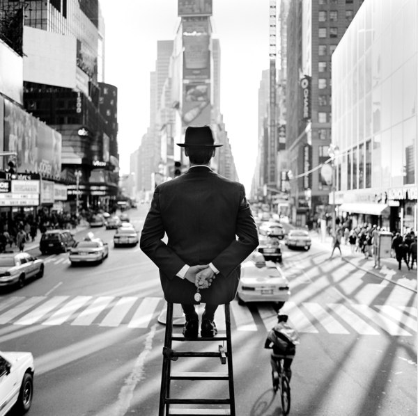 Rodney Smith, Man on Ladder in Times Square, New York, 1999