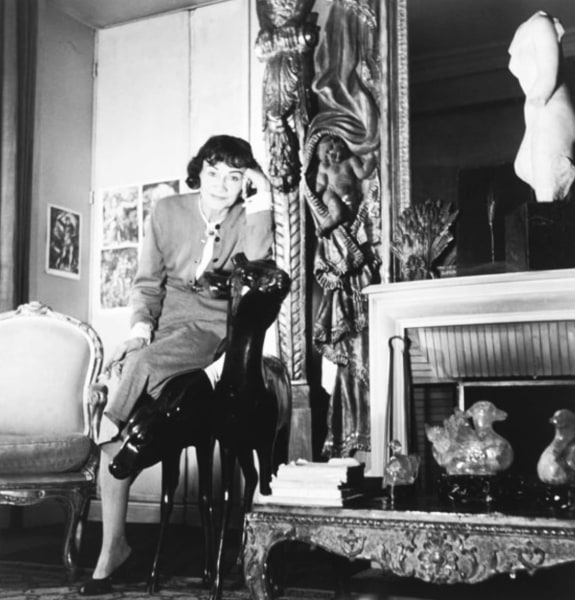 Louise Dahl-Wolfe, Coco Chanel Leaning on Chair in her Apartment, 1954