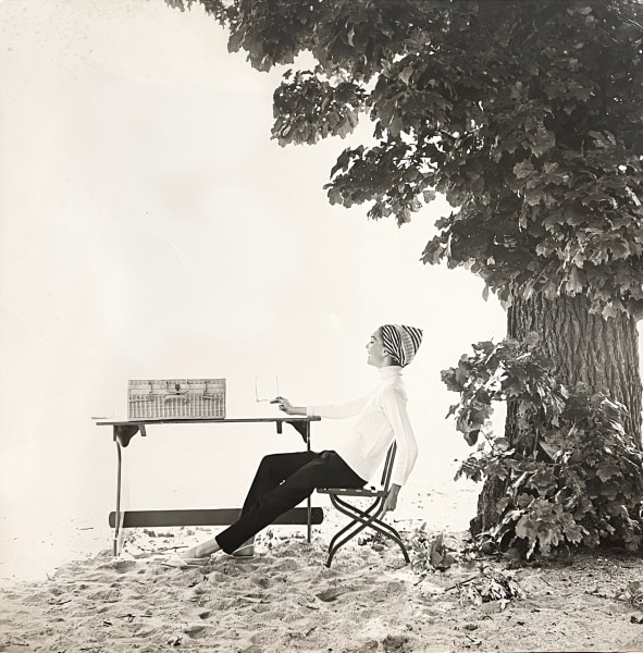 Tom Palumbo, Model on Beach with Table, Harper’s Bazaar, December 1954
